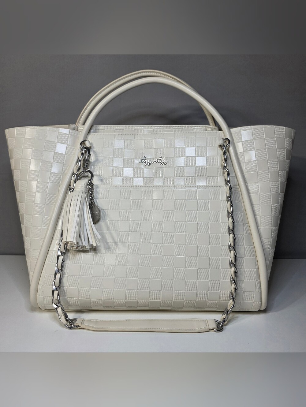 Itzy Ritzy Boss Tote Diaper Bag Limited-edition checkered pattern.
